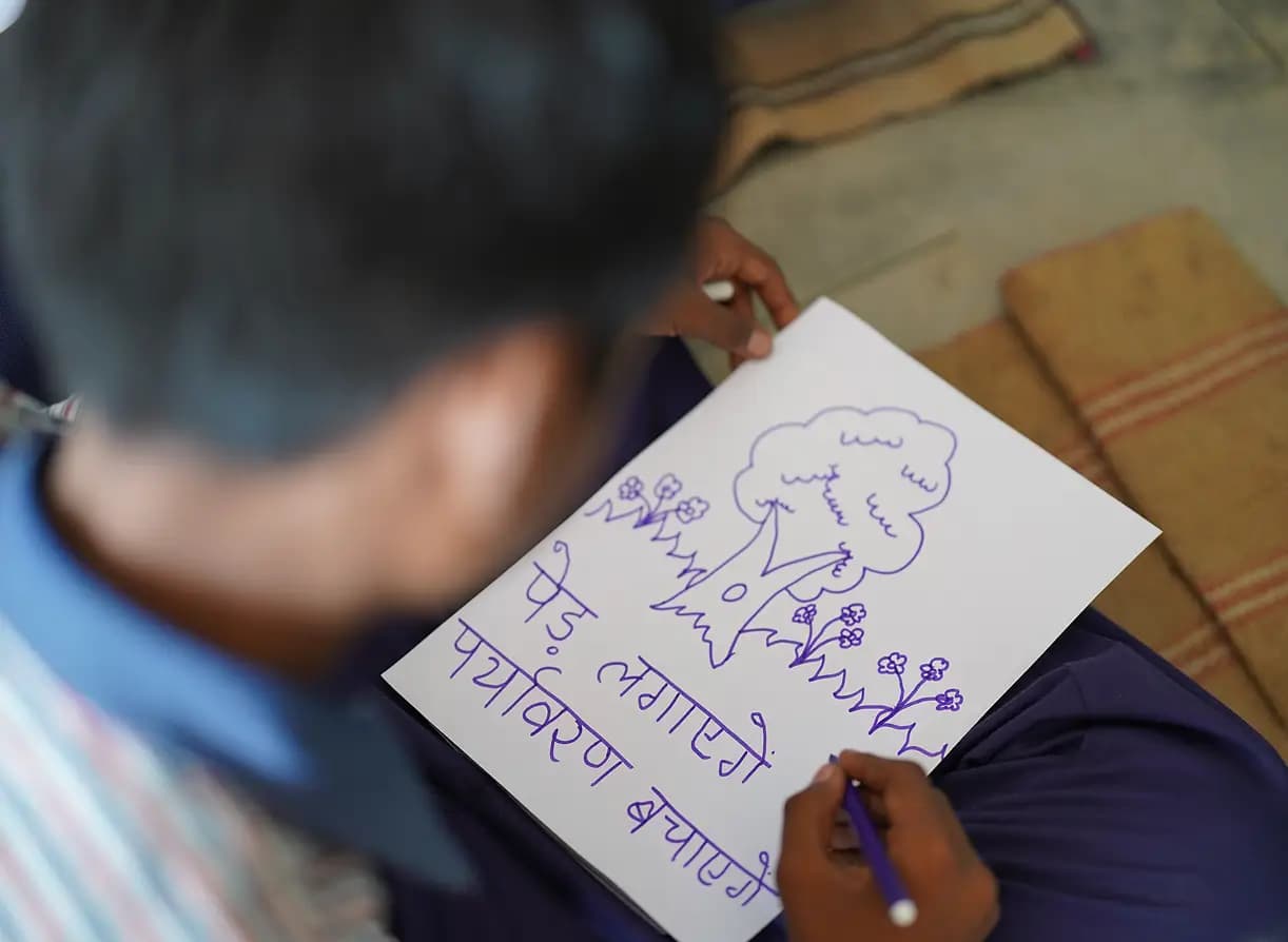 Artisan sketching a tree design