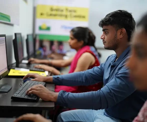 Students working at a digital learning center