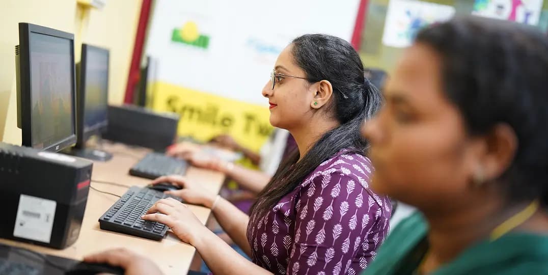 Women learning in Smile Twin e-Learning Centre classroom